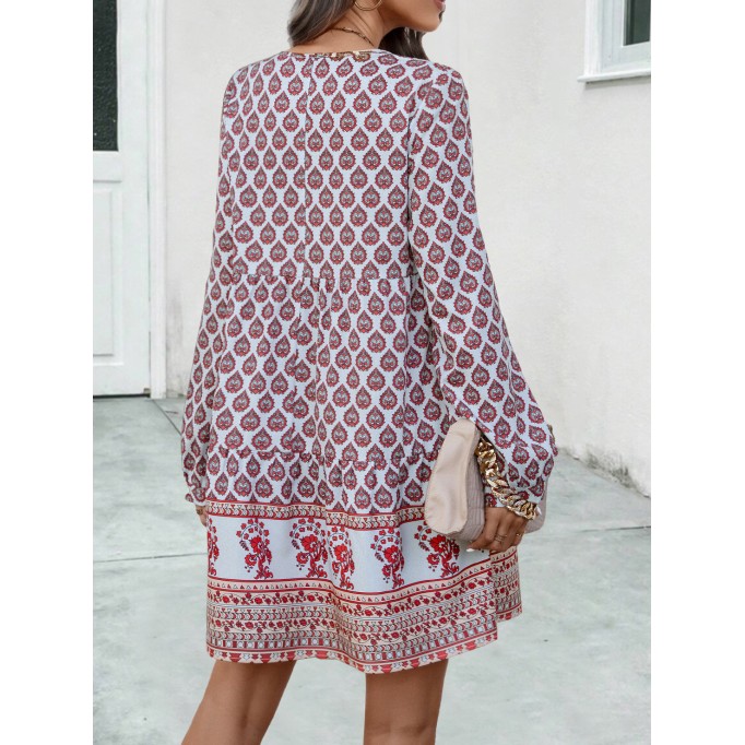 Long sleeve positioning print dress