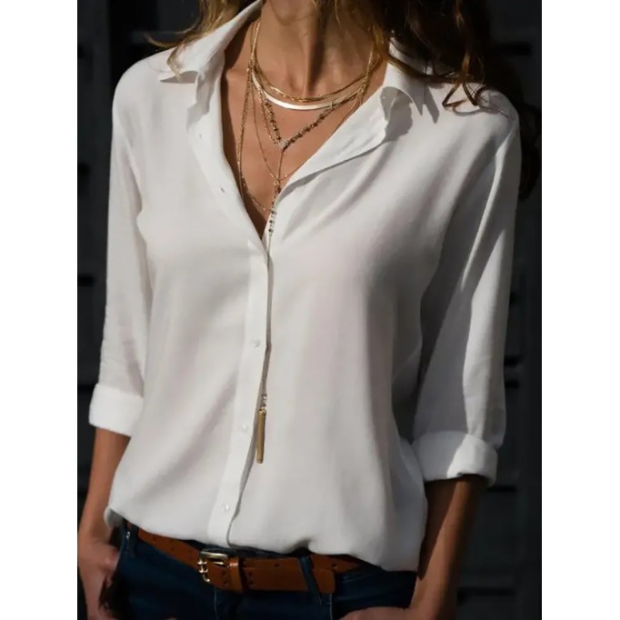 Women's solid color long sleeved button up shirt